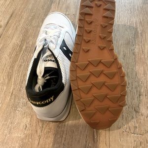 Brand new, never even been untied. White with navy accents. Perfect summer shoe